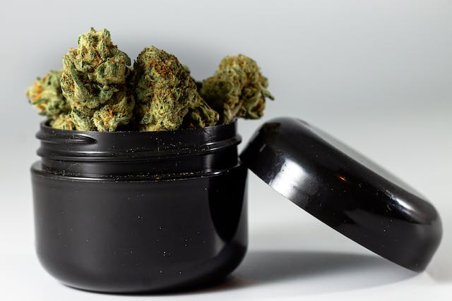 medical cannabis in a black container